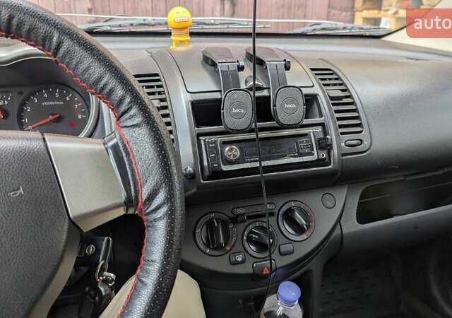 Сірий Ніссан Ноут, об'ємом двигуна 1.4 л та пробігом 378 тис. км за 4600 $, фото 7 на Automoto.ua