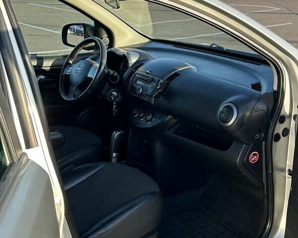 Серый Ниссан Ноут, объемом двигателя 1.6 л и пробегом 120 тыс. км за 6999 $, фото 21 на Automoto.ua