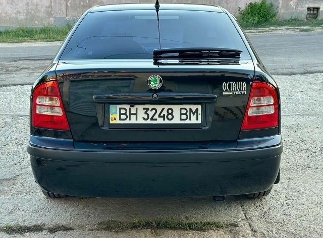 Сірий Ніссан Ноут, об'ємом двигуна 1.6 л та пробігом 170 тис. км за 5200 $, фото 8 на Automoto.ua
