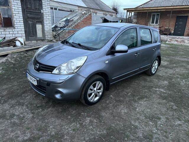 Серый Ниссан Ноут, объемом двигателя 1.4 л и пробегом 238 тыс. км за 4999 $, фото 5 на Automoto.ua