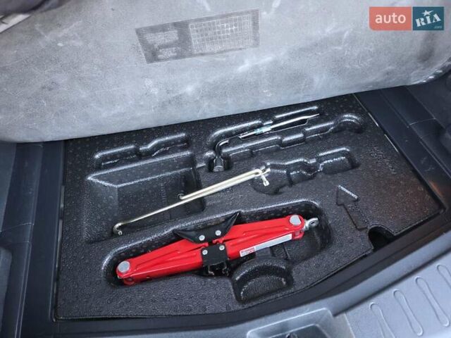 Сірий Ніссан Ноут, об'ємом двигуна 1.6 л та пробігом 239 тис. км за 7499 $, фото 43 на Automoto.ua