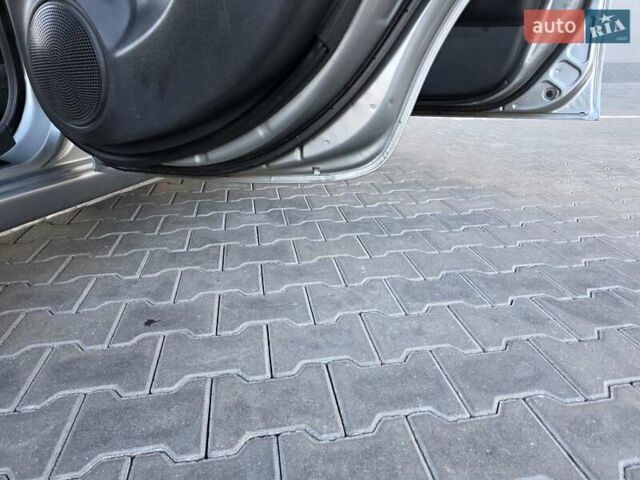 Сірий Ніссан Ноут, об'ємом двигуна 1.6 л та пробігом 239 тис. км за 7499 $, фото 39 на Automoto.ua
