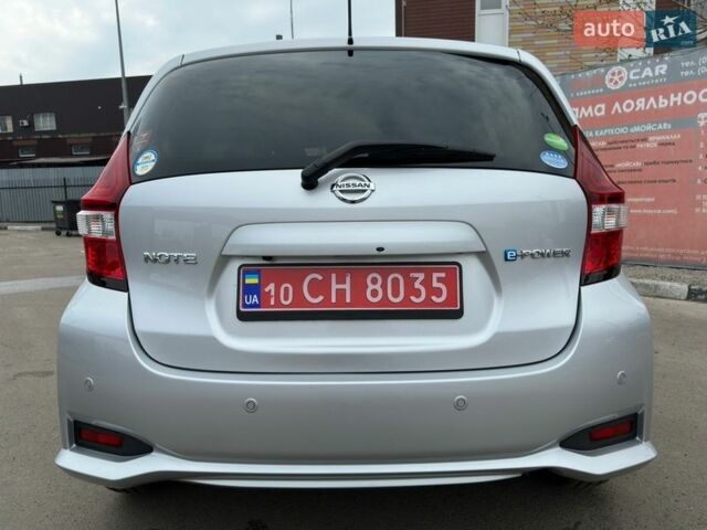 Сірий Ніссан Ноут, об'ємом двигуна 1.2 л та пробігом 83 тис. км за 12900 $, фото 6 на Automoto.ua