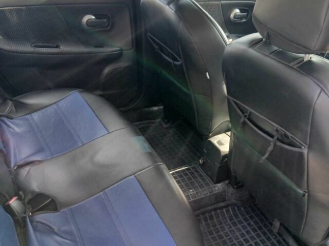 Синій Ніссан Ноут, об'ємом двигуна 1.4 л та пробігом 210 тис. км за 4649 $, фото 5 на Automoto.ua