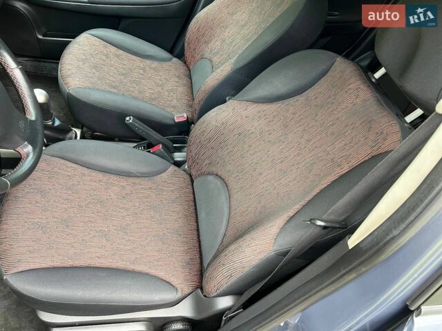 Синій Ніссан Ноут, об'ємом двигуна 1.39 л та пробігом 202 тис. км за 6190 $, фото 37 на Automoto.ua