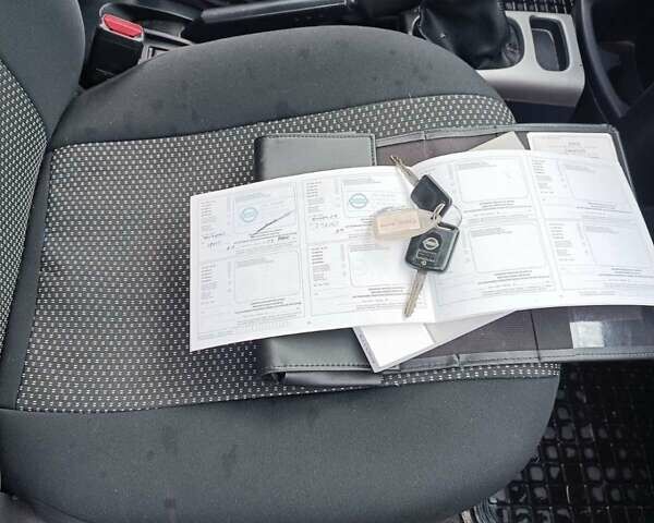 Синій Ніссан Ноут, об'ємом двигуна 1.4 л та пробігом 272 тис. км за 5600 $, фото 16 на Automoto.ua