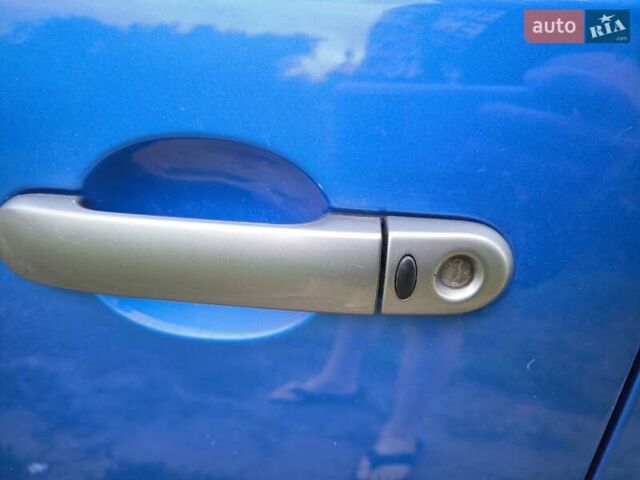 Синій Ніссан Ноут, об'ємом двигуна 1.6 л та пробігом 147 тис. км за 7799 $, фото 9 на Automoto.ua