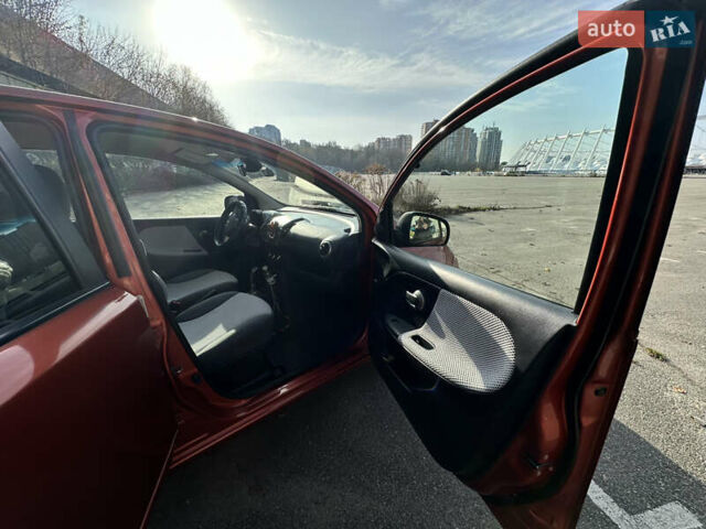 Помаранчевий Ніссан Ноут, об'ємом двигуна 1.6 л та пробігом 211 тис. км за 6600 $, фото 5 на Automoto.ua