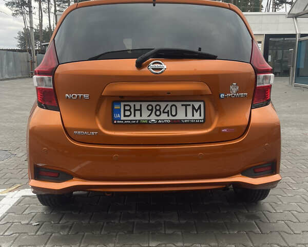 Оранжевый Ниссан Ноут, объемом двигателя 1.2 л и пробегом 55 тыс. км за 10900 $, фото 1 на Automoto.ua