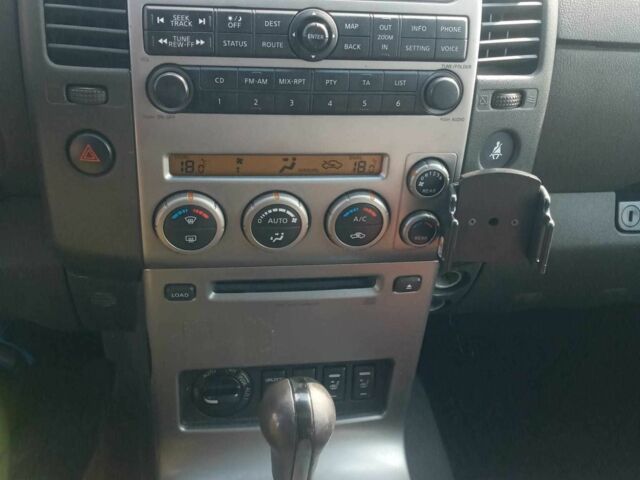 Черный Ниссан Патфайндер, объемом двигателя 2.5 л и пробегом 257 тыс. км за 6595 $, фото 2 на Automoto.ua