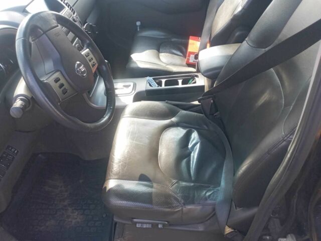 Черный Ниссан Патфайндер, объемом двигателя 2.5 л и пробегом 257 тыс. км за 6595 $, фото 3 на Automoto.ua