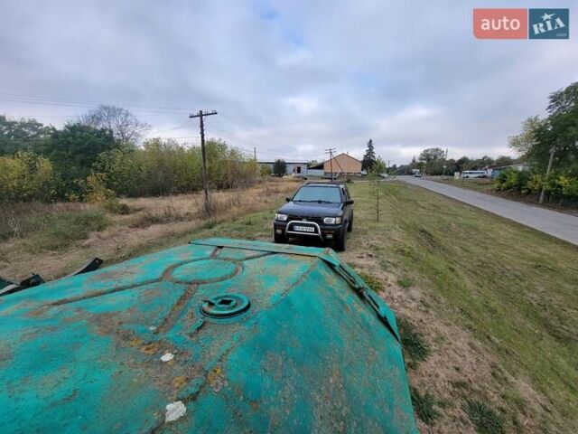 Чорний Ніссан Патфайндер, об'ємом двигуна 3.3 л та пробігом 285 тис. км за 5000 $, фото 8 на Automoto.ua