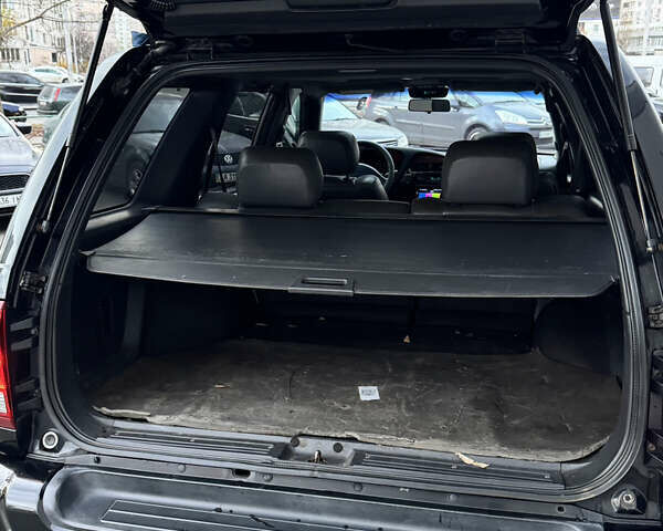 Черный Ниссан Патфайндер, объемом двигателя 3.3 л и пробегом 465 тыс. км за 5999 $, фото 19 на Automoto.ua