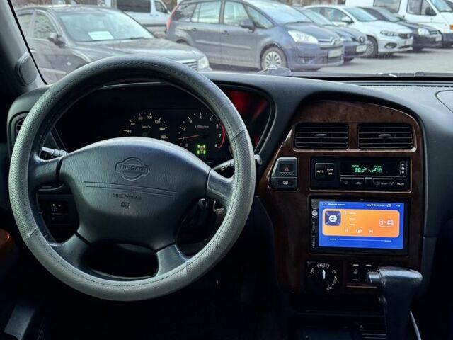 Чорний Ніссан Патфайндер, об'ємом двигуна 3.3 л та пробігом 465 тис. км за 5600 $, фото 13 на Automoto.ua