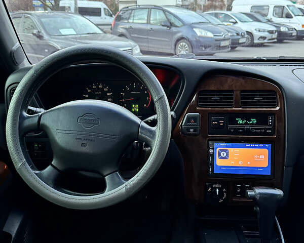 Черный Ниссан Патфайндер, объемом двигателя 3.3 л и пробегом 465 тыс. км за 5999 $, фото 13 на Automoto.ua