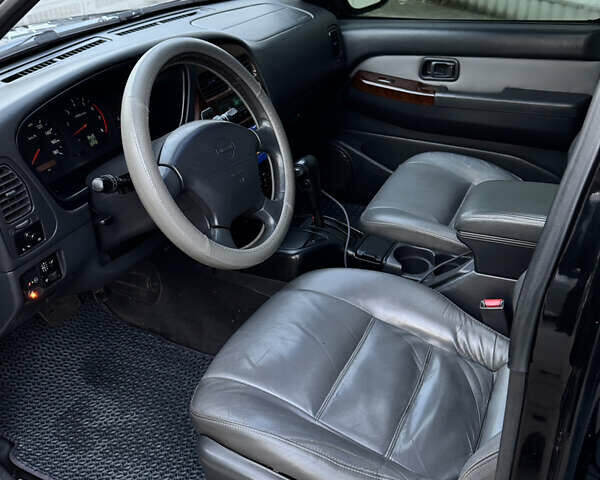 Черный Ниссан Патфайндер, объемом двигателя 3.3 л и пробегом 465 тыс. км за 5999 $, фото 9 на Automoto.ua