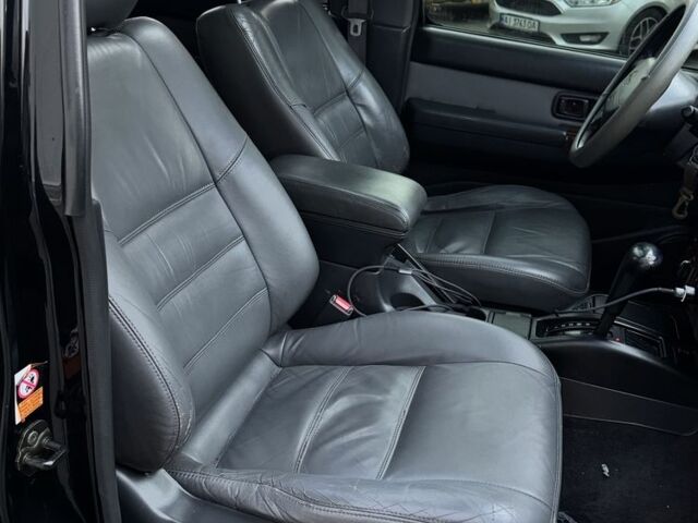 Чорний Ніссан Патфайндер, об'ємом двигуна 3.3 л та пробігом 465 тис. км за 5600 $, фото 17 на Automoto.ua