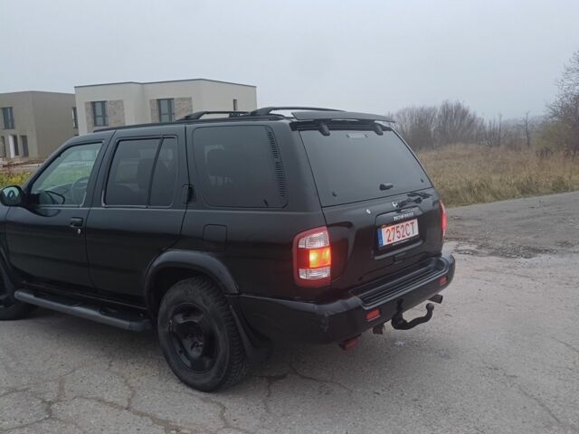 Черный Ниссан Патфайндер, объемом двигателя 3.5 л и пробегом 286 тыс. км за 4637 $, фото 2 на Automoto.ua