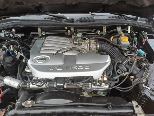 Черный Ниссан Патфайндер, объемом двигателя 3.5 л и пробегом 286 тыс. км за 4637 $, фото 6 на Automoto.ua