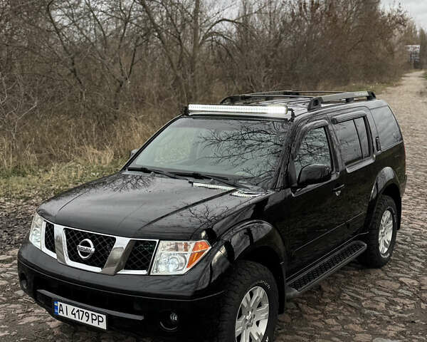 Черный Ниссан Патфайндер, объемом двигателя 4 л и пробегом 183 тыс. км за 9400 $, фото 1 на Automoto.ua