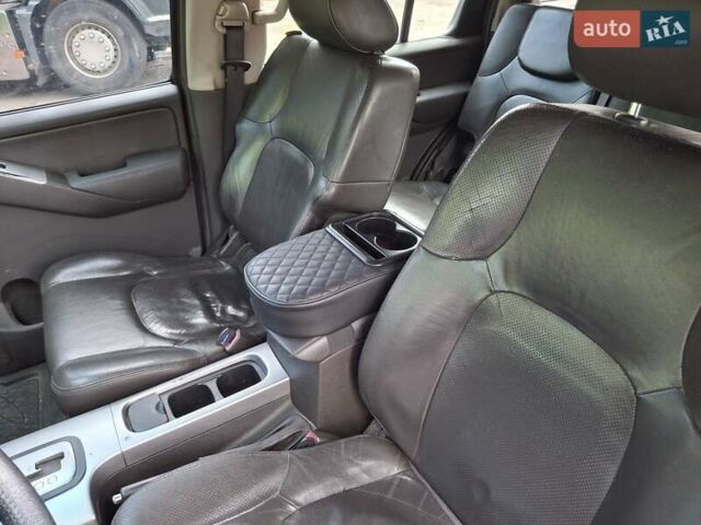 Черный Ниссан Патфайндер, объемом двигателя 2.5 л и пробегом 215 тыс. км за 10700 $, фото 1 на Automoto.ua