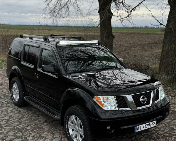Черный Ниссан Патфайндер, объемом двигателя 4 л и пробегом 183 тыс. км за 9400 $, фото 8 на Automoto.ua