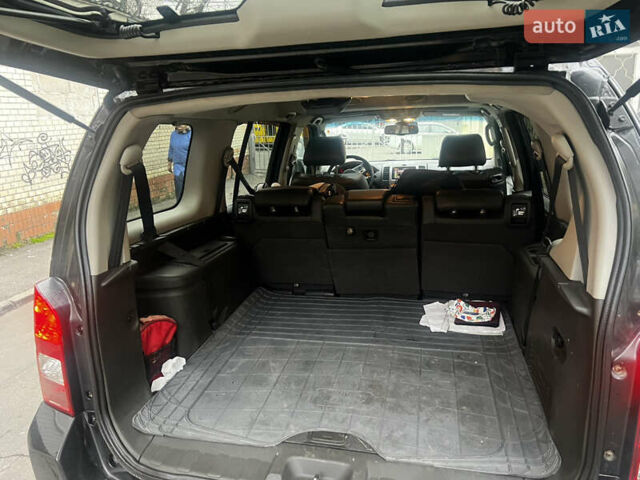 Черный Ниссан Патфайндер, объемом двигателя 2.49 л и пробегом 261 тыс. км за 11300 $, фото 17 на Automoto.ua
