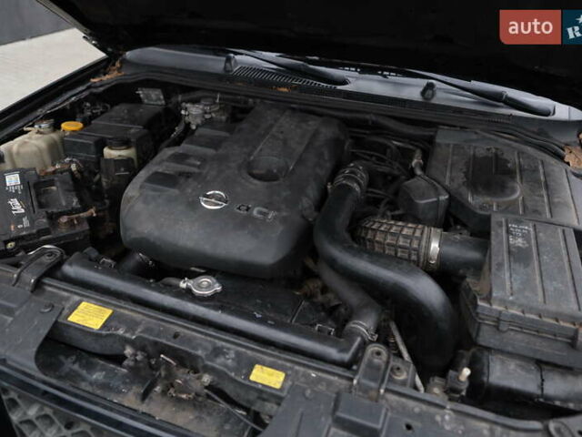 Черный Ниссан Патфайндер, объемом двигателя 2.5 л и пробегом 299 тыс. км за 8950 $, фото 14 на Automoto.ua
