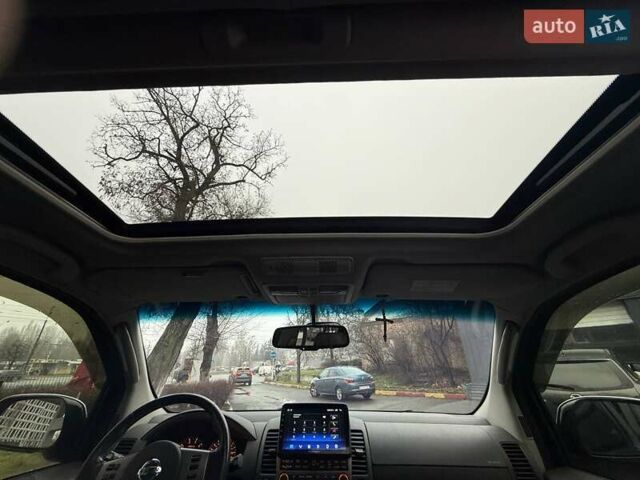 Черный Ниссан Патфайндер, объемом двигателя 2.49 л и пробегом 178 тыс. км за 13500 $, фото 21 на Automoto.ua