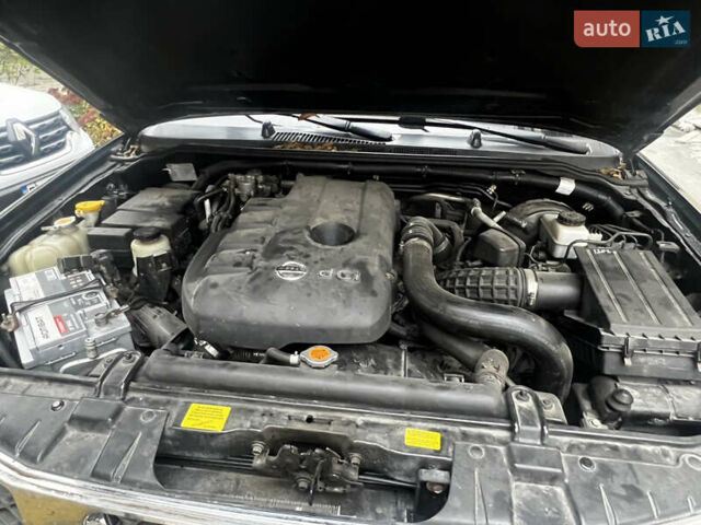 Черный Ниссан Патфайндер, объемом двигателя 2.49 л и пробегом 261 тыс. км за 11300 $, фото 3 на Automoto.ua