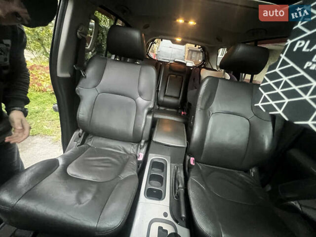 Черный Ниссан Патфайндер, объемом двигателя 2.49 л и пробегом 261 тыс. км за 11300 $, фото 10 на Automoto.ua