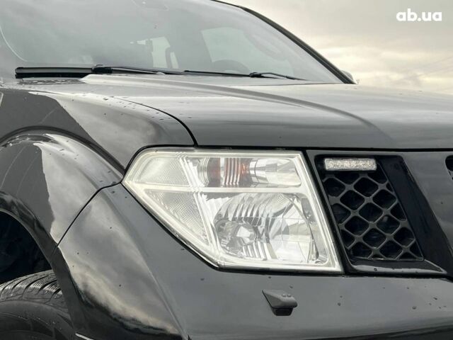 Черный Ниссан Патфайндер, объемом двигателя 2.5 л и пробегом 253 тыс. км за 9690 $, фото 11 на Automoto.ua