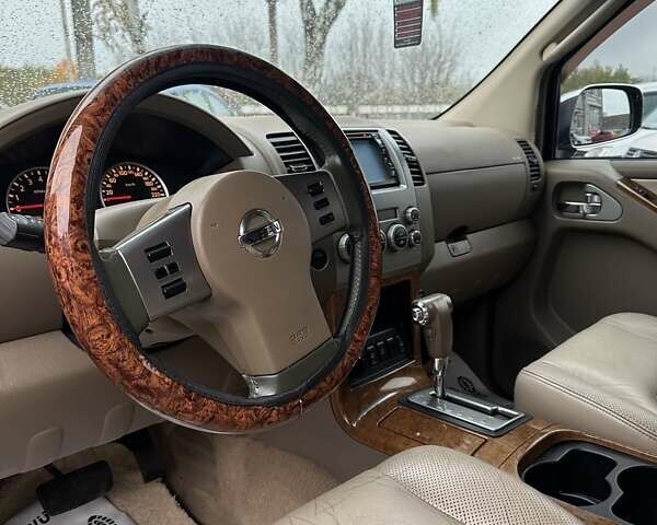 Ніссан Патфайндер 2007 у Смеле на Automoto.ua Чорний Ніссан Патфайндер, об'ємом двигуна 4 л та пробігом 300 тис. км за 9500 $, фото 18 на Automoto.ua