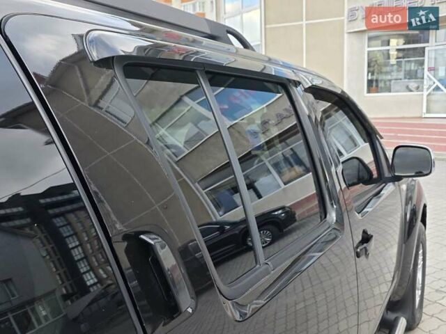 Чорний Ніссан Патфайндер, об'ємом двигуна 2.5 л та пробігом 237 тис. км за 9777 $, фото 47 на Automoto.ua