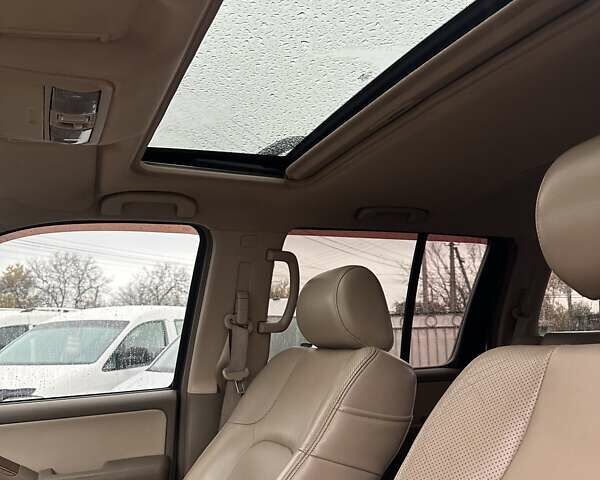 Чорний Ніссан Патфайндер, об'ємом двигуна 4 л та пробігом 300 тис. км за 9500 $, фото 14 на Automoto.ua