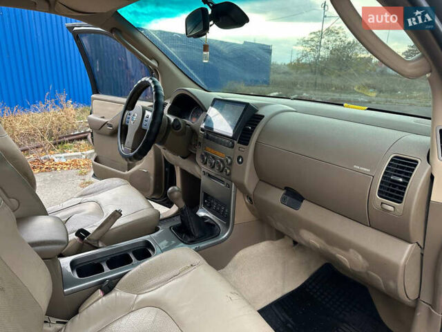 Черный Ниссан Патфайндер, объемом двигателя 2.49 л и пробегом 253 тыс. км за 7999 $, фото 21 на Automoto.ua