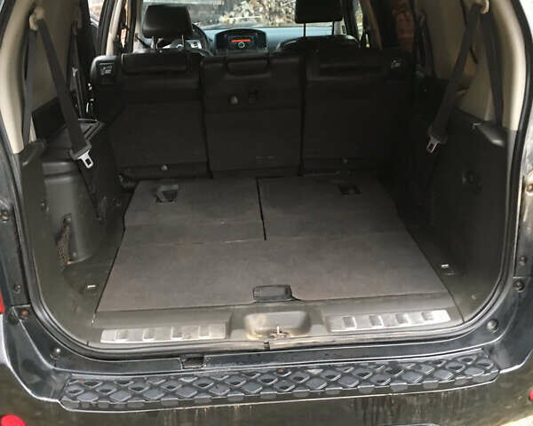 Черный Ниссан Патфайндер, объемом двигателя 2.5 л и пробегом 250 тыс. км за 11200 $, фото 11 на Automoto.ua