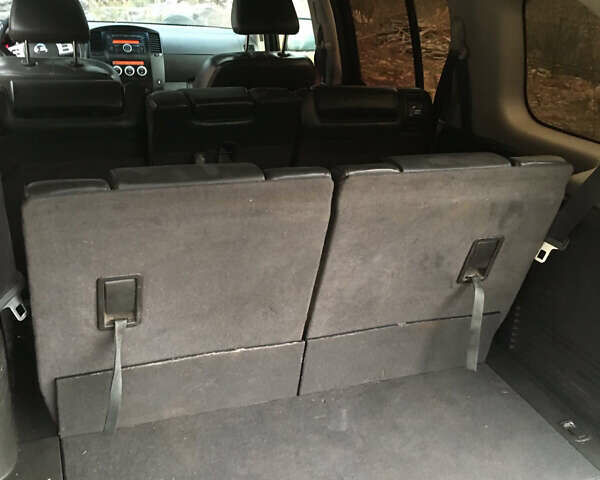 Черный Ниссан Патфайндер, объемом двигателя 2.5 л и пробегом 250 тыс. км за 11200 $, фото 12 на Automoto.ua