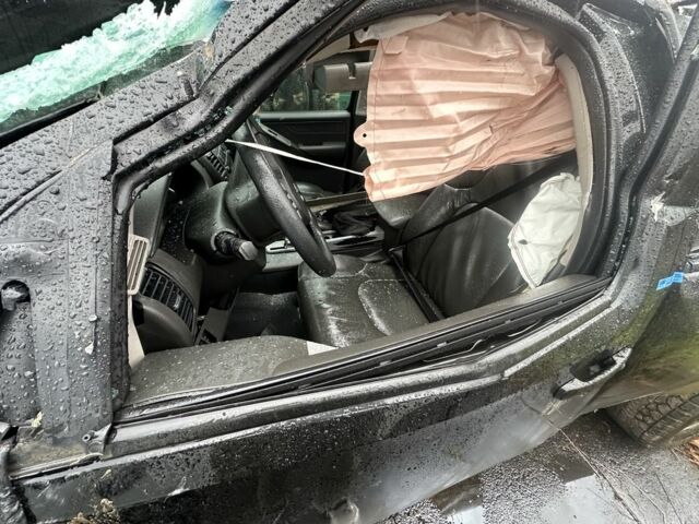 Черный Ниссан Патфайндер, объемом двигателя 2.5 л и пробегом 200 тыс. км за 4700 $, фото 7 на Automoto.ua