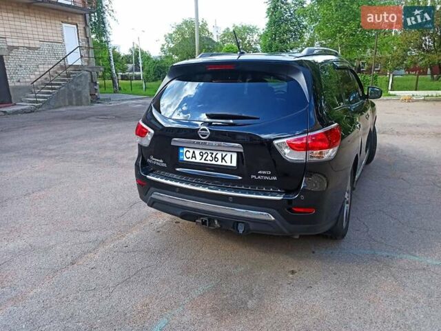 Черный Ниссан Патфайндер, объемом двигателя 3.5 л и пробегом 240 тыс. км за 13500 $, фото 2 на Automoto.ua