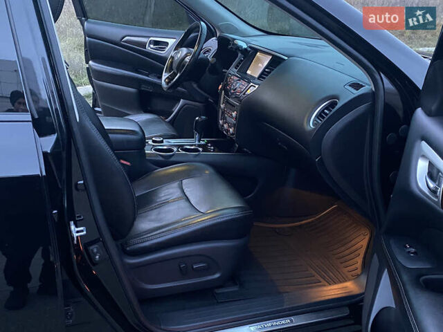 Черный Ниссан Патфайндер, объемом двигателя 3.5 л и пробегом 245 тыс. км за 12900 $, фото 25 на Automoto.ua