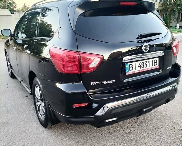 Черный Ниссан Патфайндер, объемом двигателя 3.5 л и пробегом 87 тыс. км за 17000 $, фото 7 на Automoto.ua