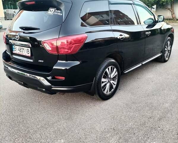 Черный Ниссан Патфайндер, объемом двигателя 3.5 л и пробегом 87 тыс. км за 17000 $, фото 2 на Automoto.ua