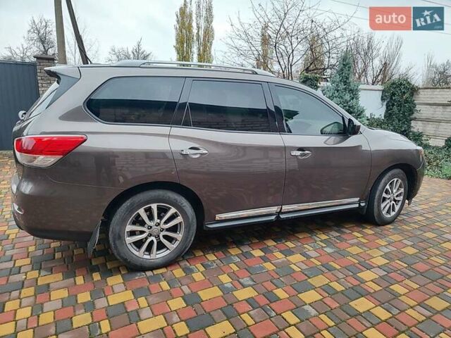 Коричневый Ниссан Патфайндер, объемом двигателя 3.5 л и пробегом 214 тыс. км за 13500 $, фото 1 на Automoto.ua