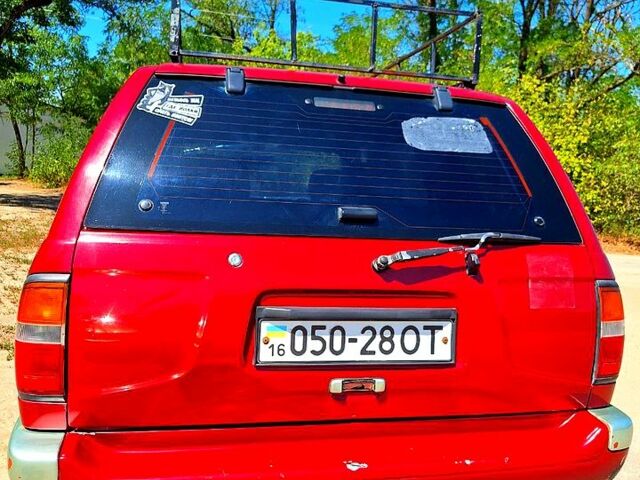 Красный Ниссан Патфайндер, объемом двигателя 3.3 л и пробегом 147 тыс. км за 3960 $, фото 1 на Automoto.ua