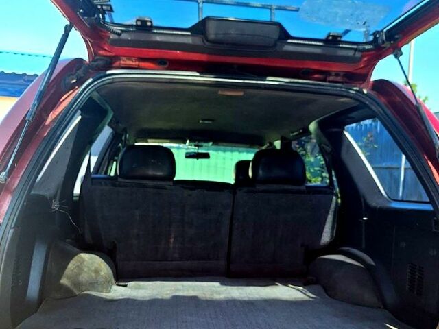 Красный Ниссан Патфайндер, объемом двигателя 3.3 л и пробегом 147 тыс. км за 3960 $, фото 6 на Automoto.ua