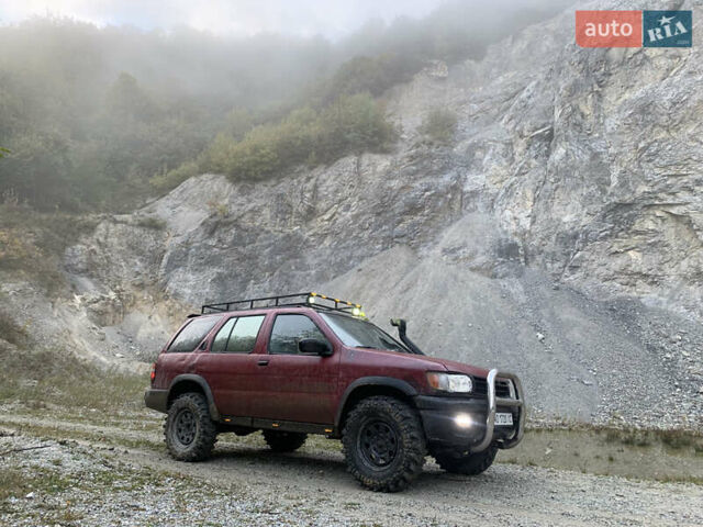 Червоний Ніссан Патфайндер, об'ємом двигуна 2.5 л та пробігом 300 тис. км за 4300 $, фото 4 на Automoto.ua