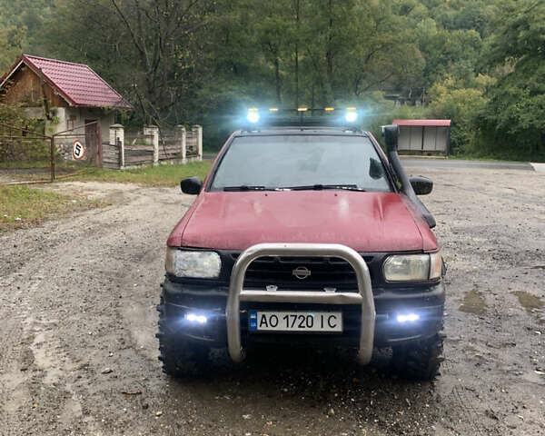 Червоний Ніссан Патфайндер, об'ємом двигуна 2.5 л та пробігом 300 тис. км за 4300 $, фото 17 на Automoto.ua