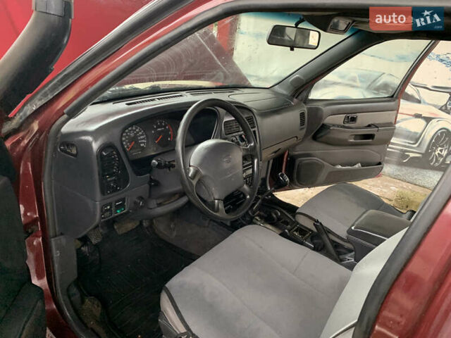 Червоний Ніссан Патфайндер, об'ємом двигуна 2.5 л та пробігом 300 тис. км за 4300 $, фото 9 на Automoto.ua