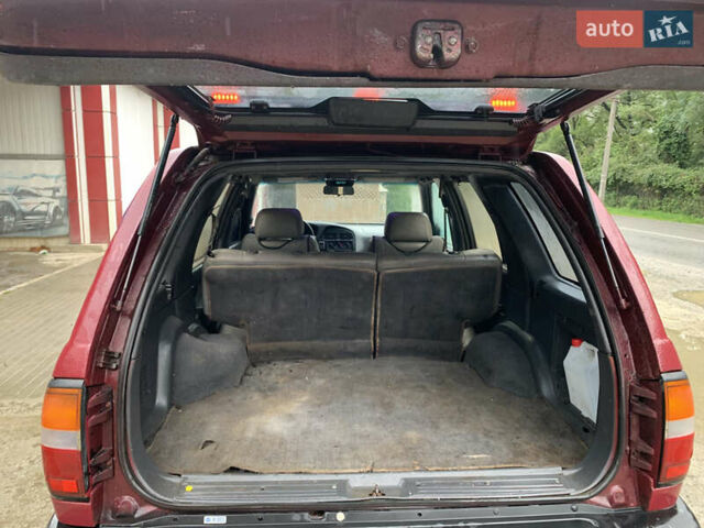Червоний Ніссан Патфайндер, об'ємом двигуна 2.5 л та пробігом 300 тис. км за 4300 $, фото 12 на Automoto.ua